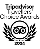 Logo for the 2024 Tripadvisor Travellers' Choice Awards, featuring an owl and laurel leaves.